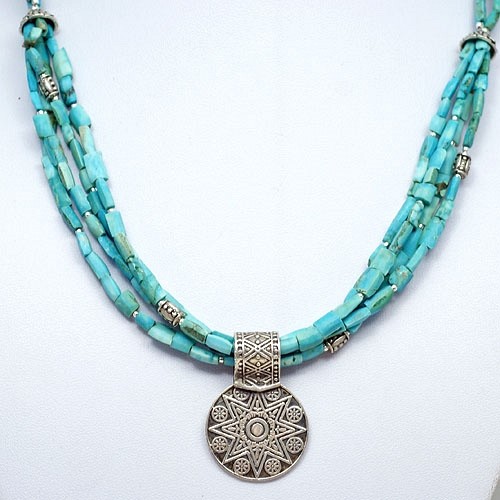 Perski turkus i amulet Siwa